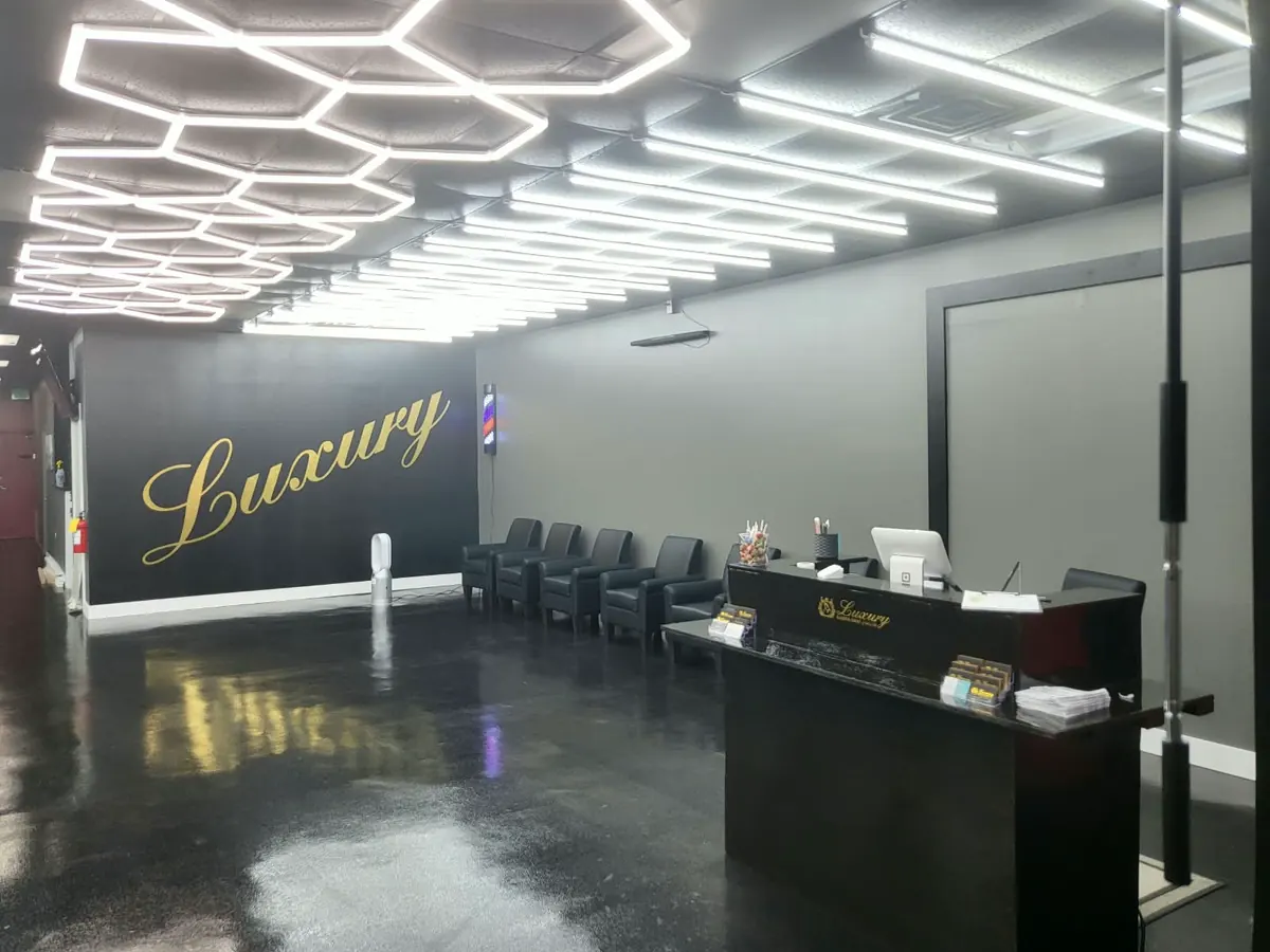 The reception desk and the painted Luxury wall